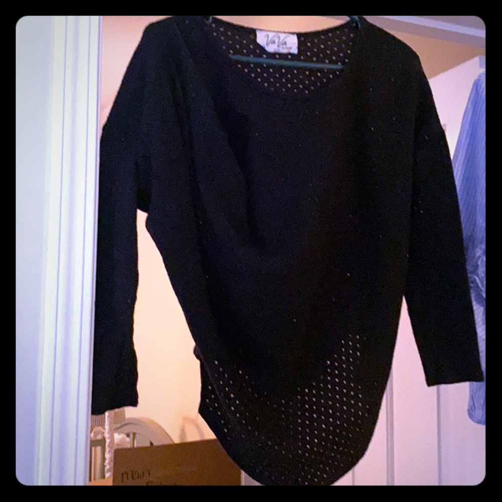 Black asymmetrical top with quarter sleeves